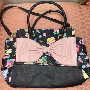 Betsey Johnson black multi-colored flower handbag with burgundy lips inside